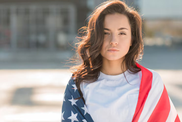 files/portrait-young-brunette-woman-holding-big-usa-flag_23-2148534449.avif